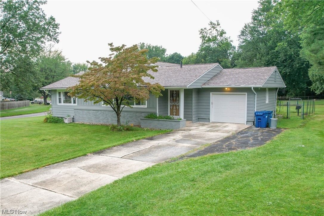 Property Photo: 8259 Fairhill Drive NE OH 44484