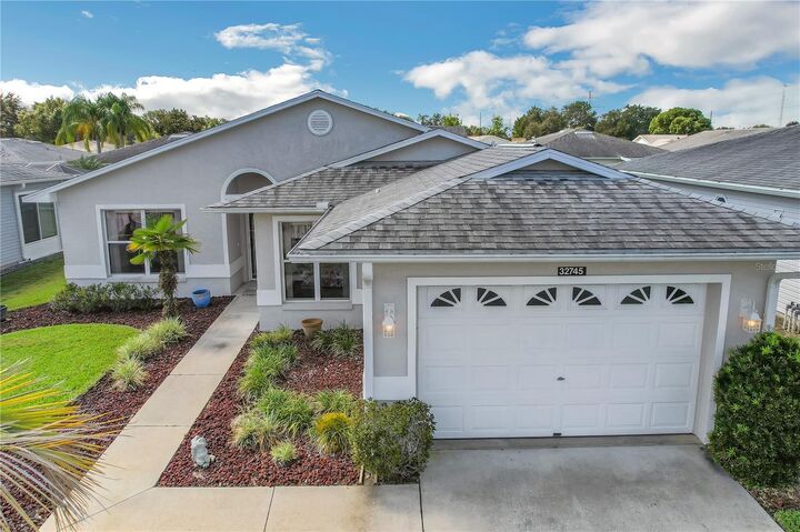 Property Photo: 32745 Westwood Loop FL 34748