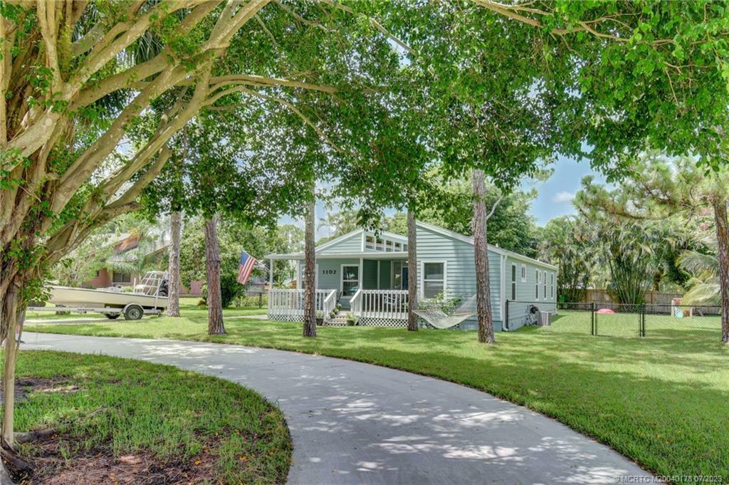 Property Photo:  1102 SW Pine Tree Lane  FL 34990 