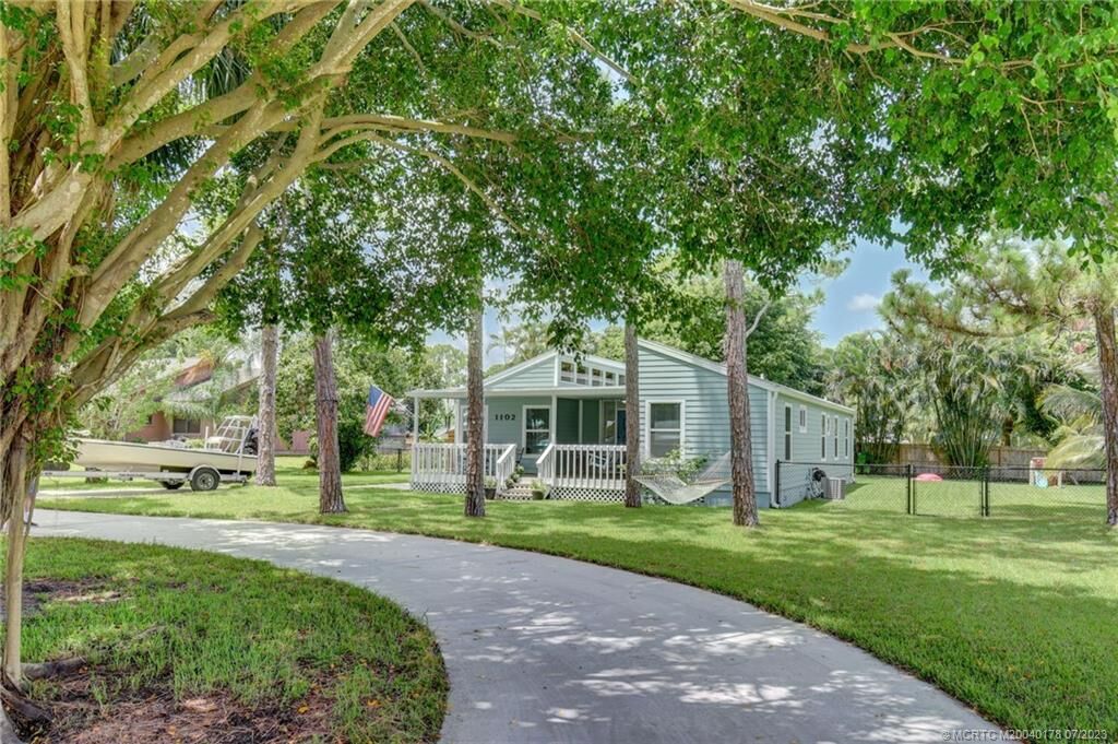 Property Photo: 1102 SW Pine Tree Lane FL 34990