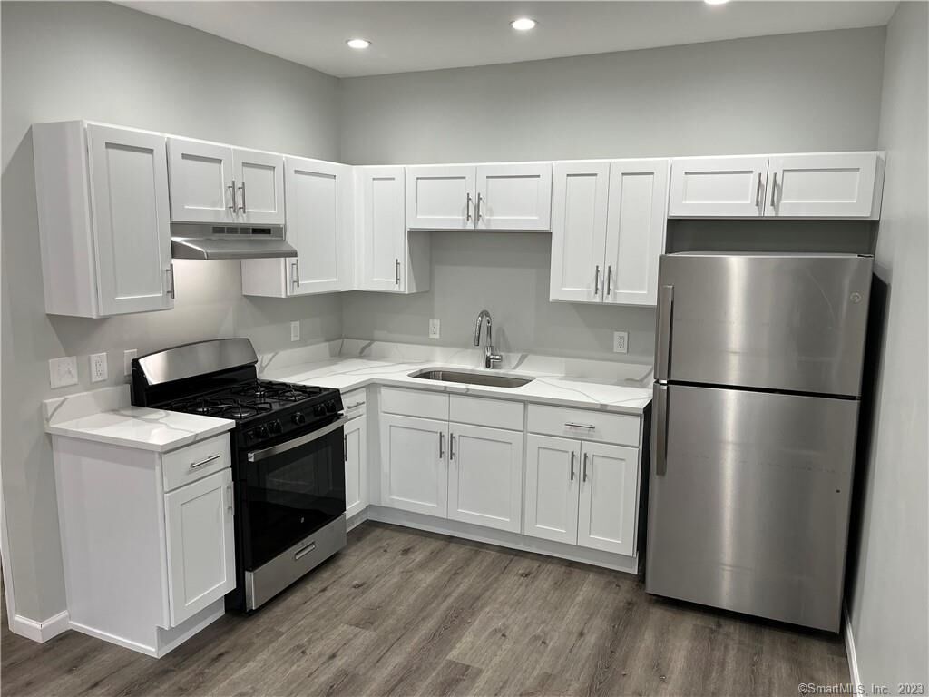 Property Photo: 893 Main Street 207 CT 06040