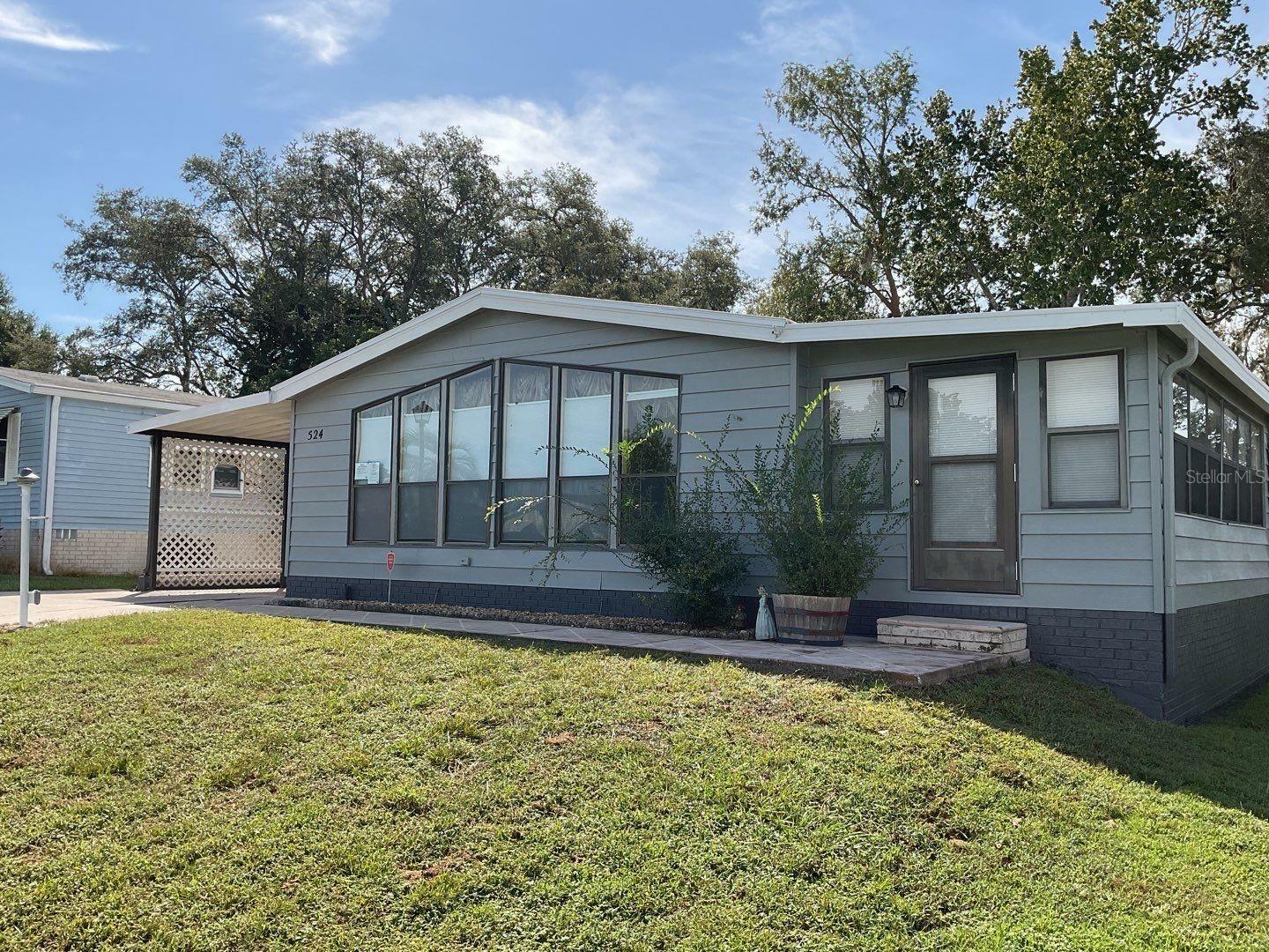 Property Photo: 524 Rainbow Boulevard FL 32159