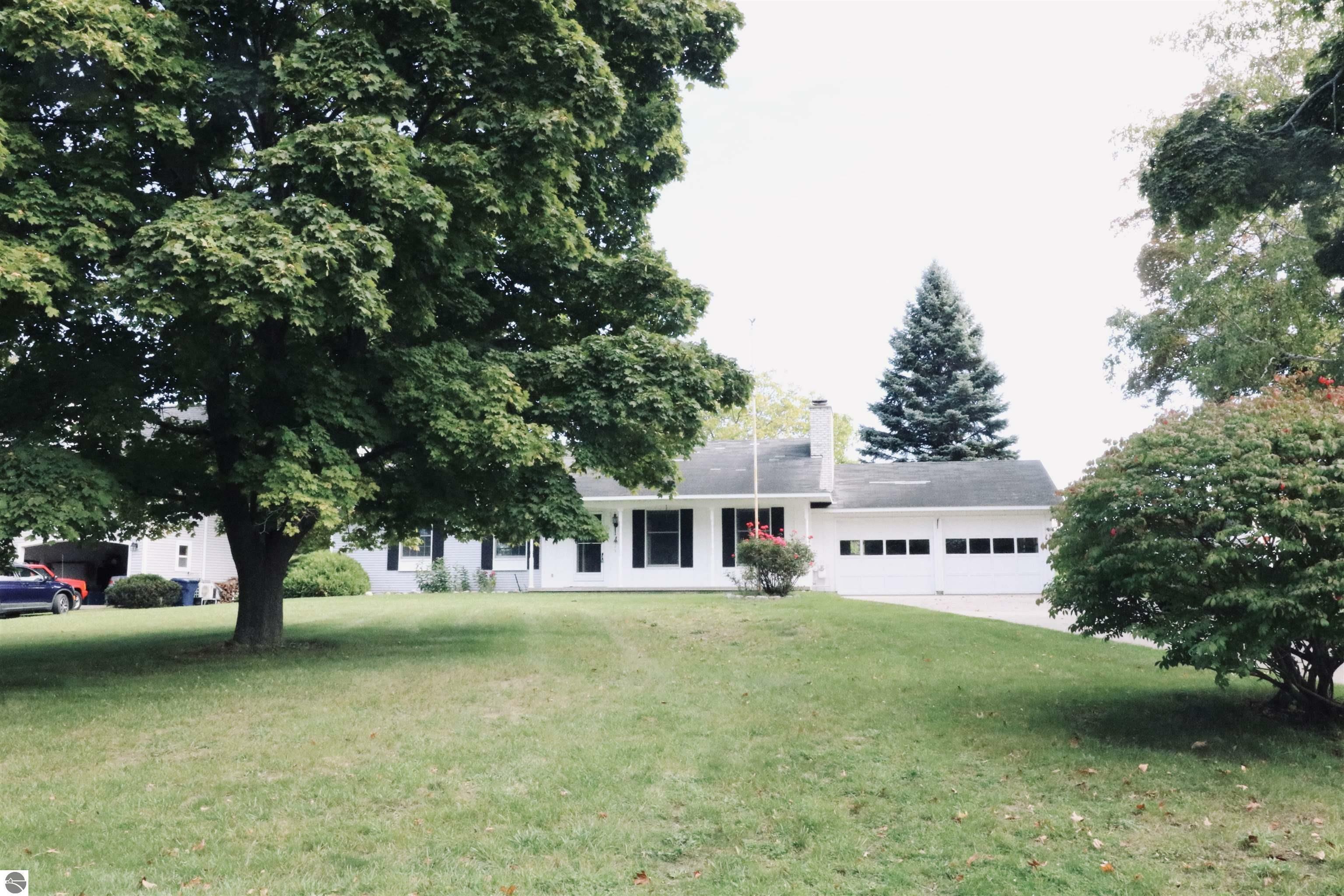 Property Photo:  13728 Peninsula Drive  MI 49686 