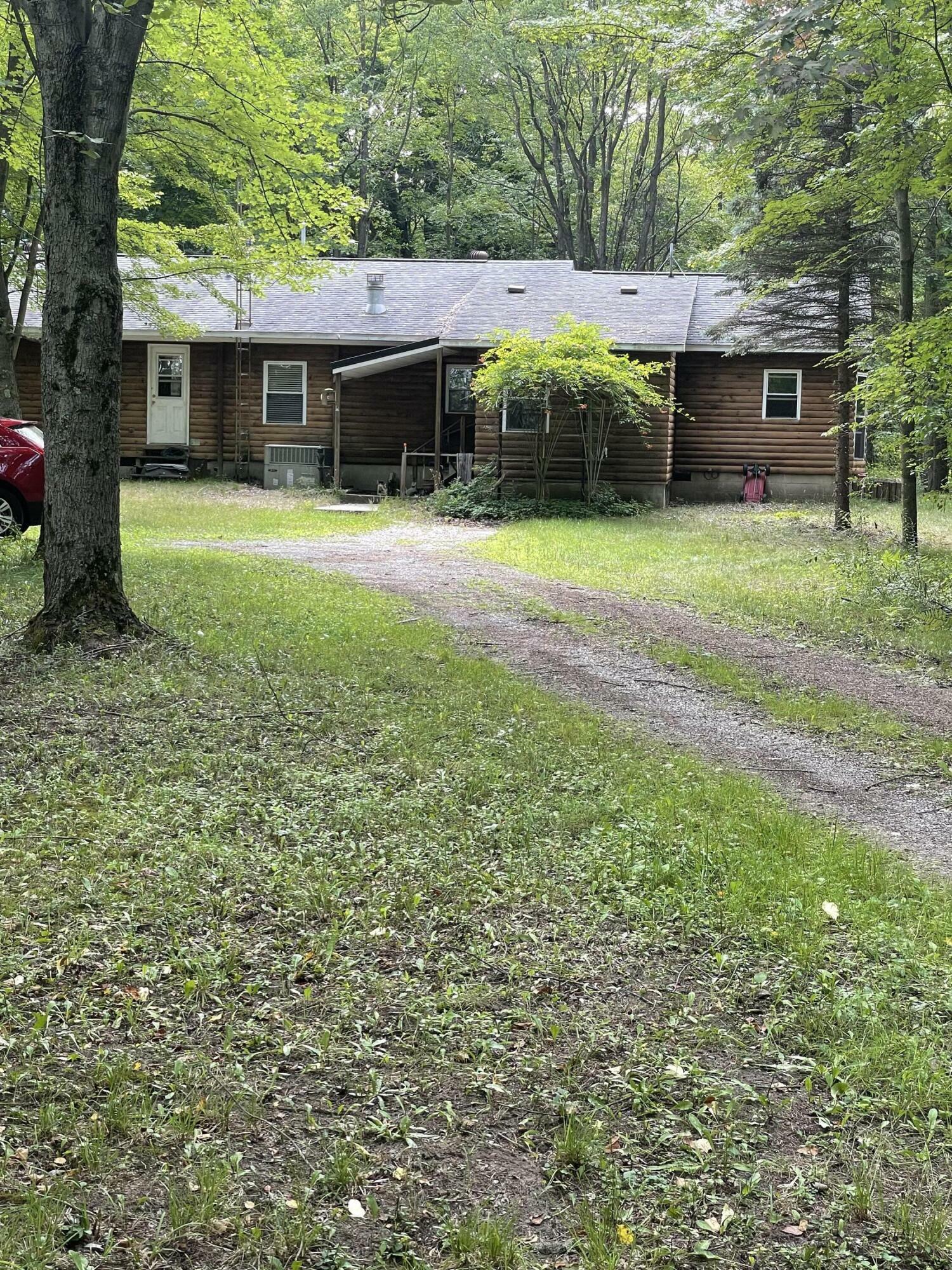 Property Photo:  2023 E Sugar Grove Road  MI 49454 