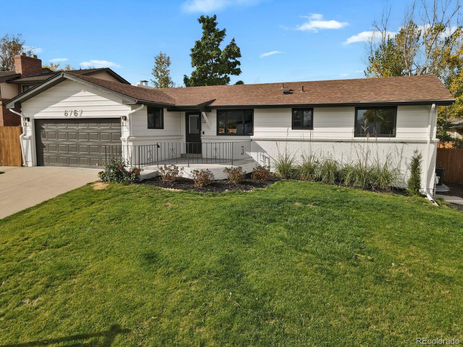 Property Photo:  6767 Ames Street  CO 80003 