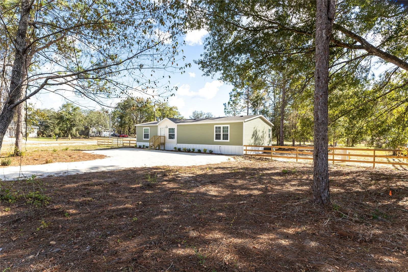 Property Photo:  10490 NE 99th Place  FL 32618 