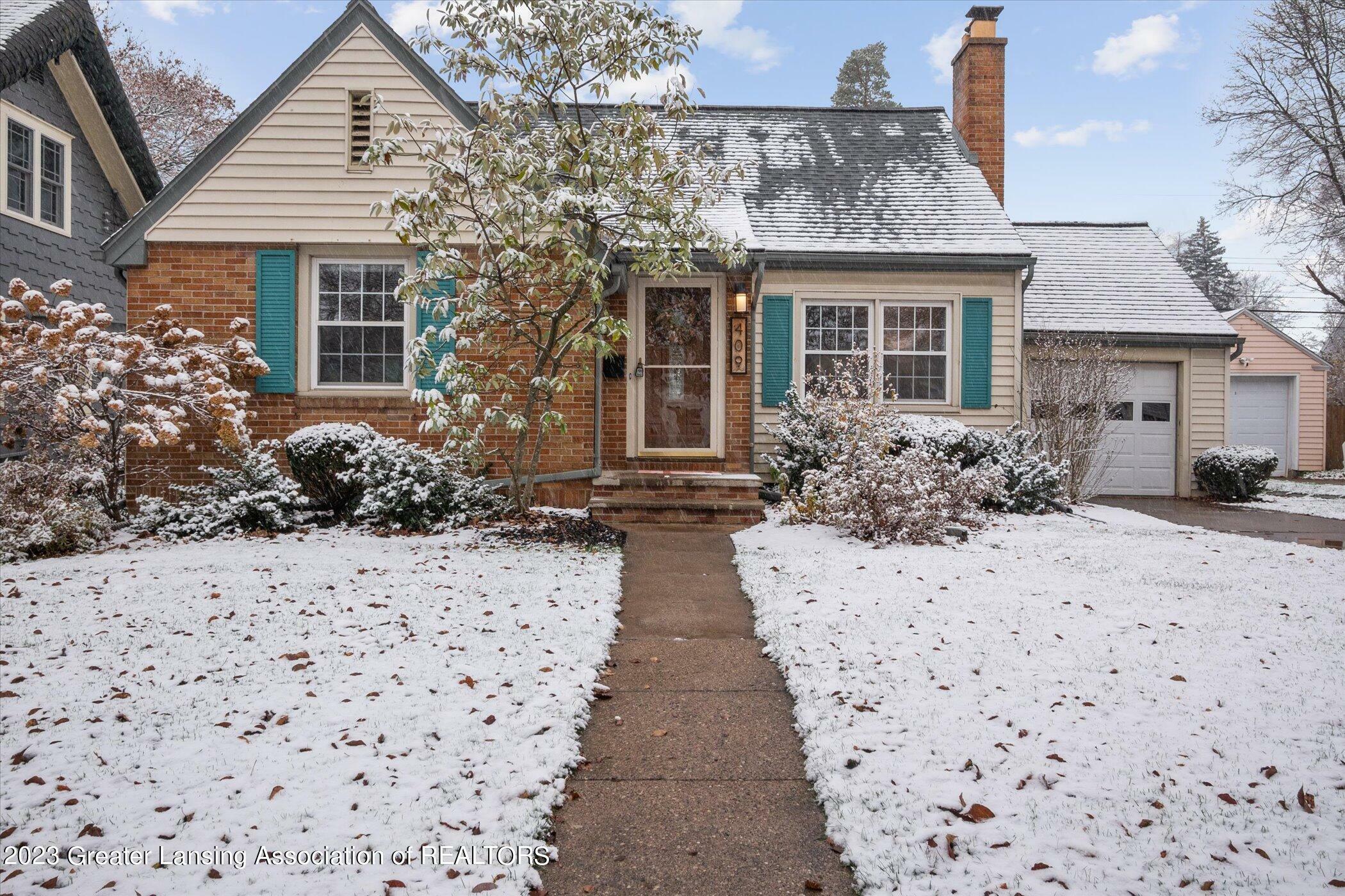 Property Photo:  409 Cowley Avenue  MI 48823 