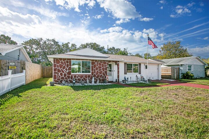 Property Photo:  6304 Westport Drive  FL 34668 