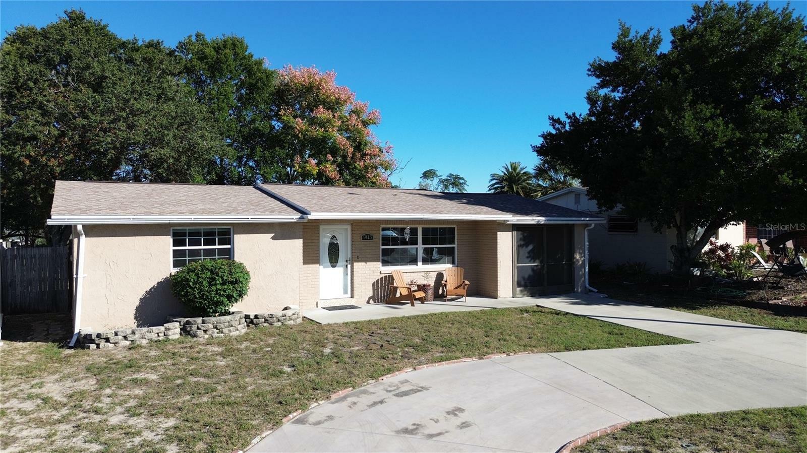 Property Photo: 7415 Neva Lane FL 34668