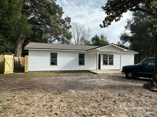 Property Photo:  732 N 62nd Ave  FL 32506 