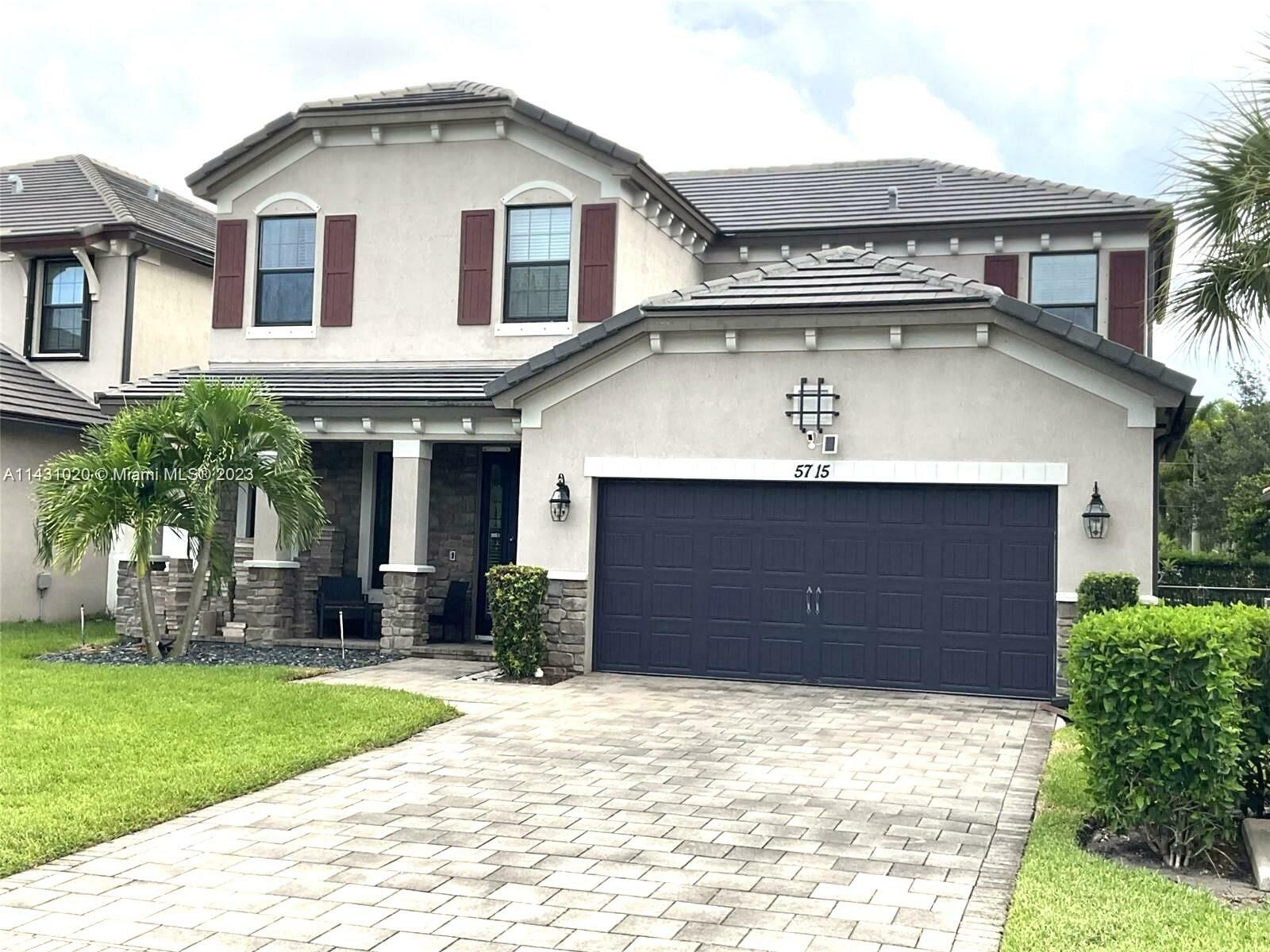 Property Photo:  5715 Sandbirch Way  FL 33463 