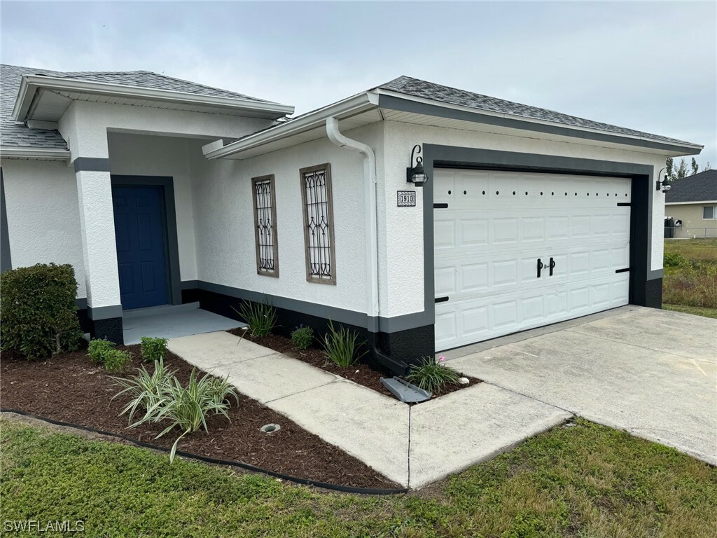 Property Photo:  1910 NW 22nd Avenue  FL 33993 