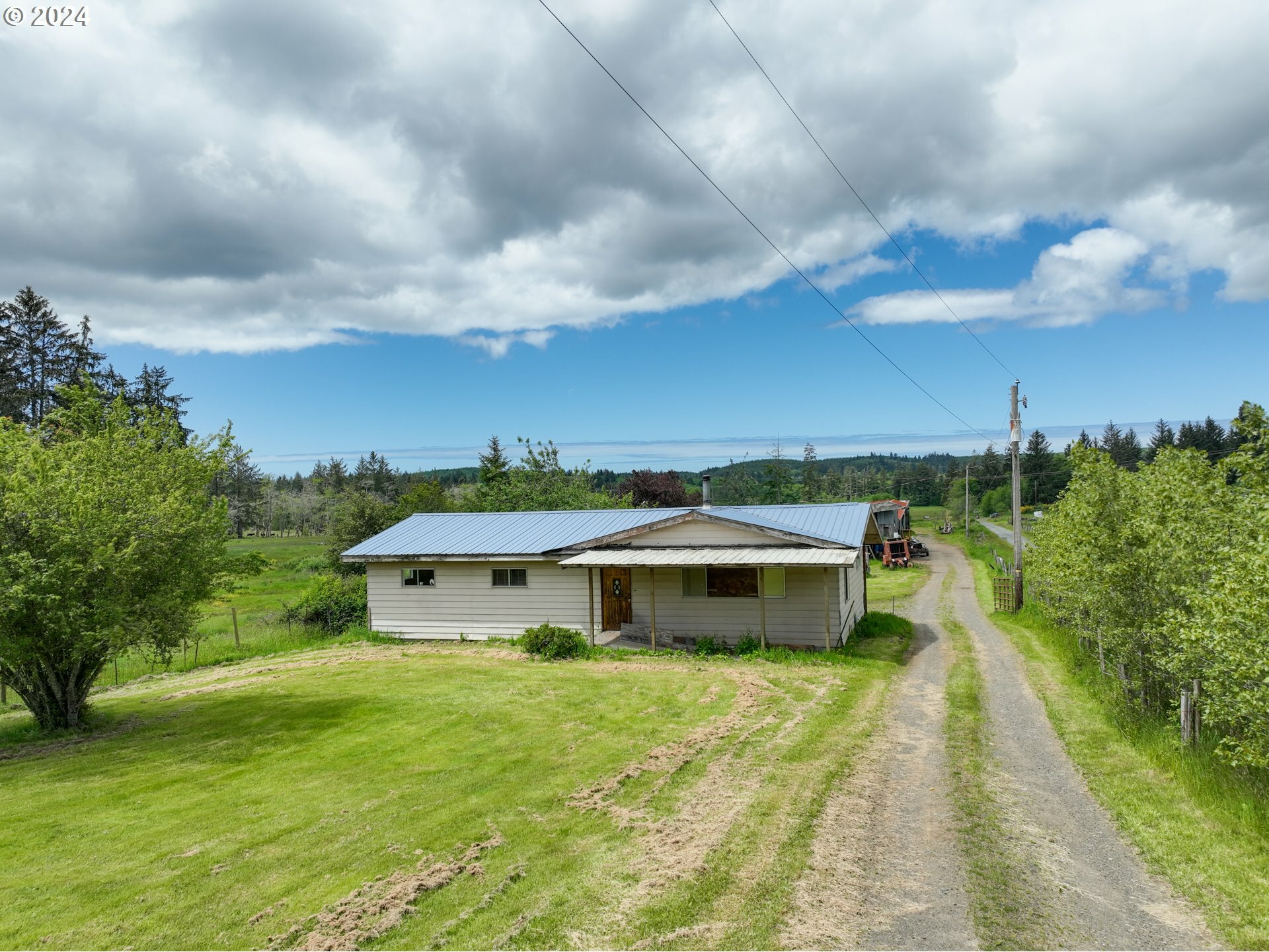 Property Photo:  89884 Logan Rd  OR 97103 