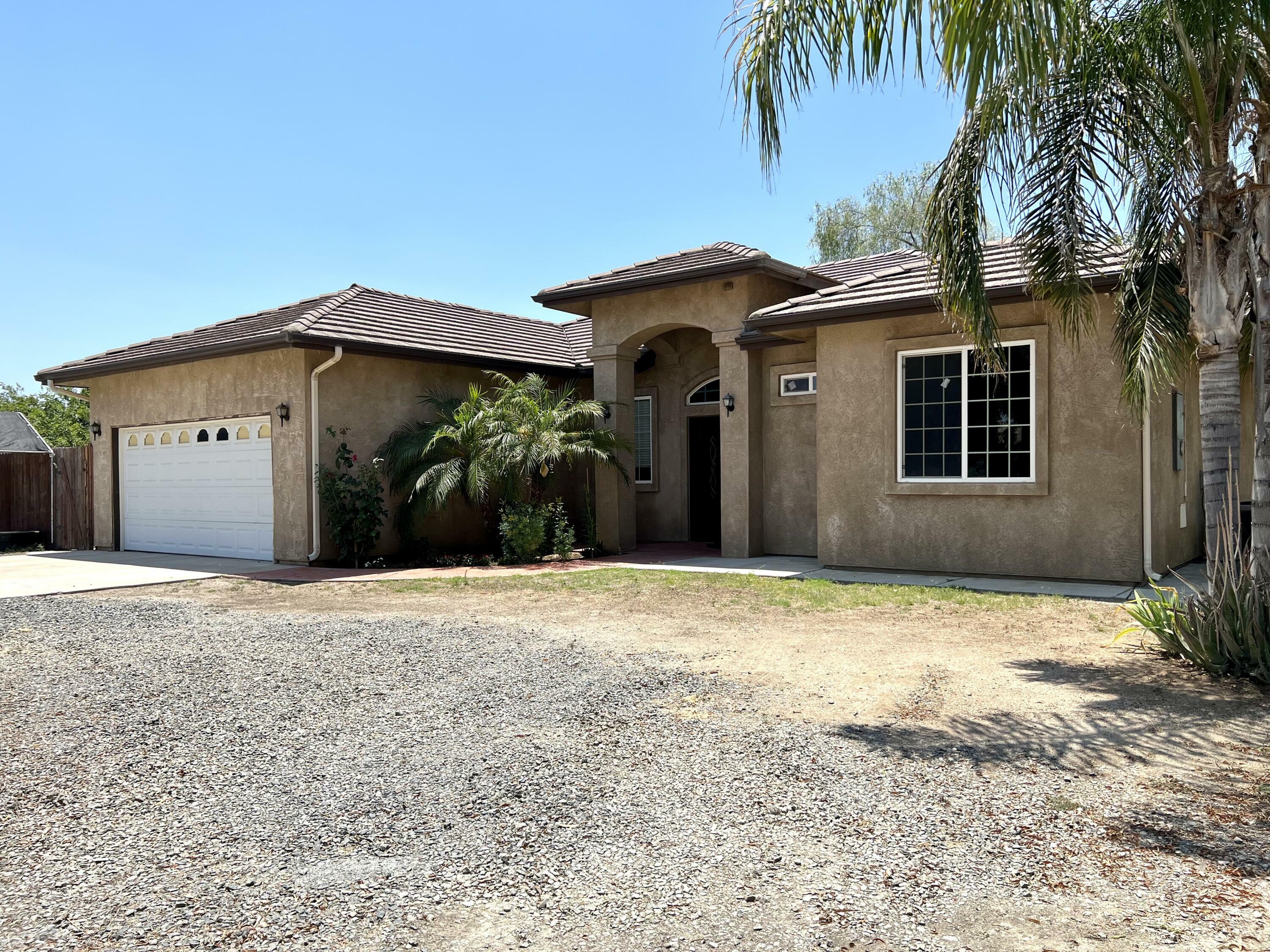 Property Photo:  805 E Worth Avenue A  CA 93257 