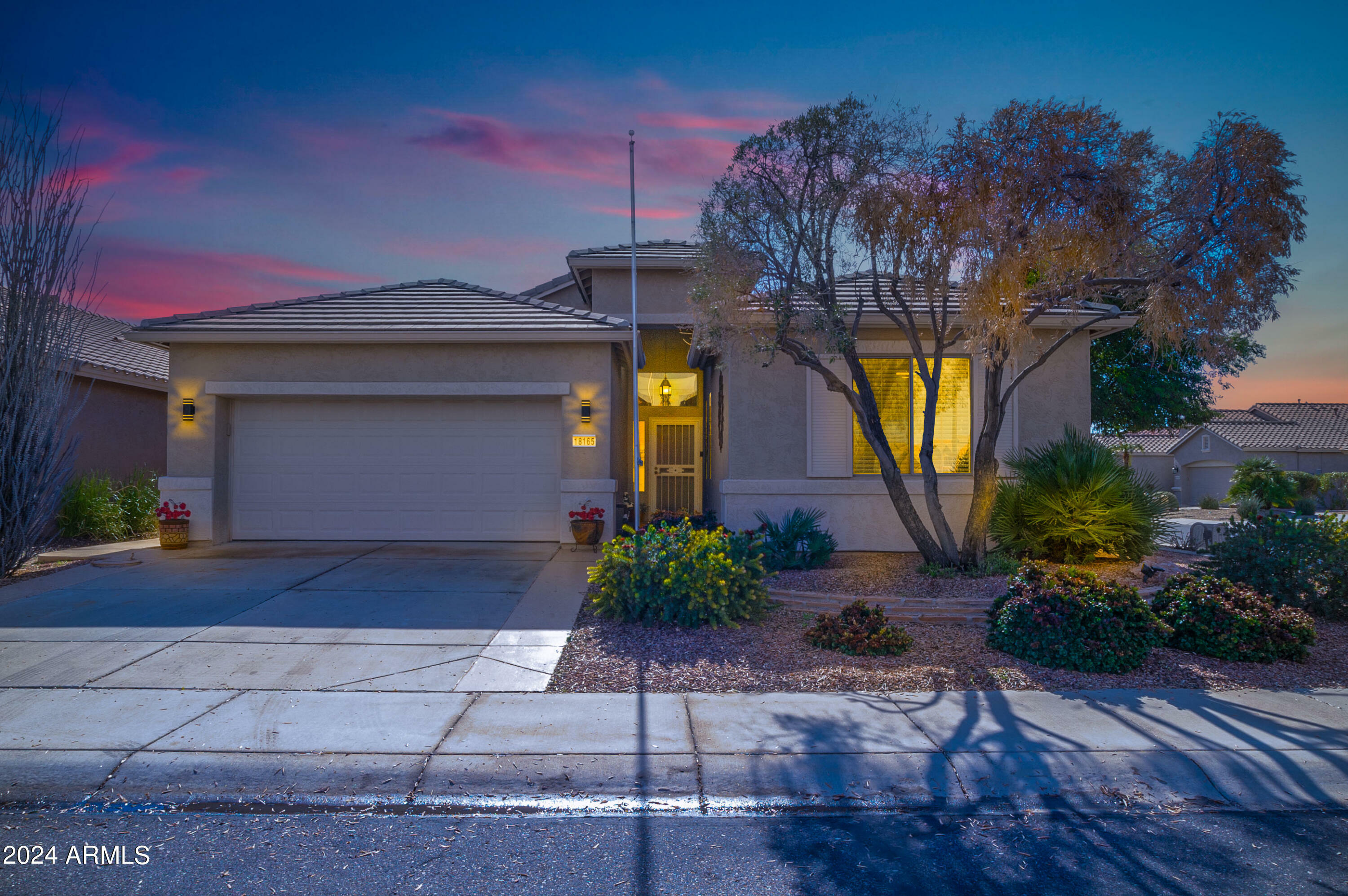 Property Photo: 18165 W Camino Real Drive AZ 85374