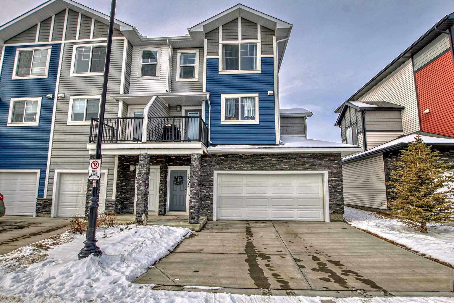 Property Photo: 1604 Jumping Pound Common AB T4C 2L1