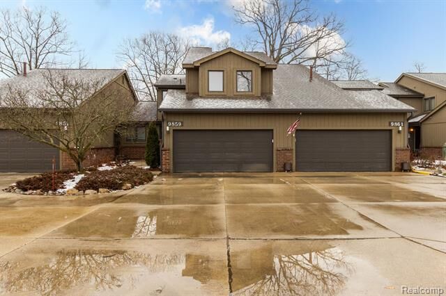 Property Photo:  9859 Hawthorne Glen  MI 48138 