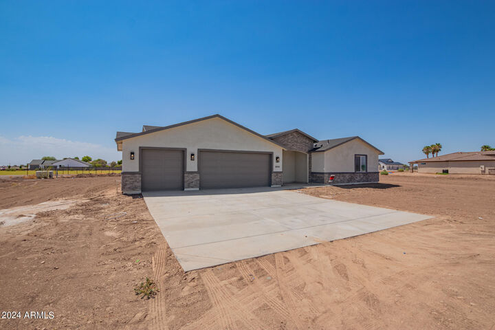 Property Photo: 10556 S 297th Avenue AZ 85343