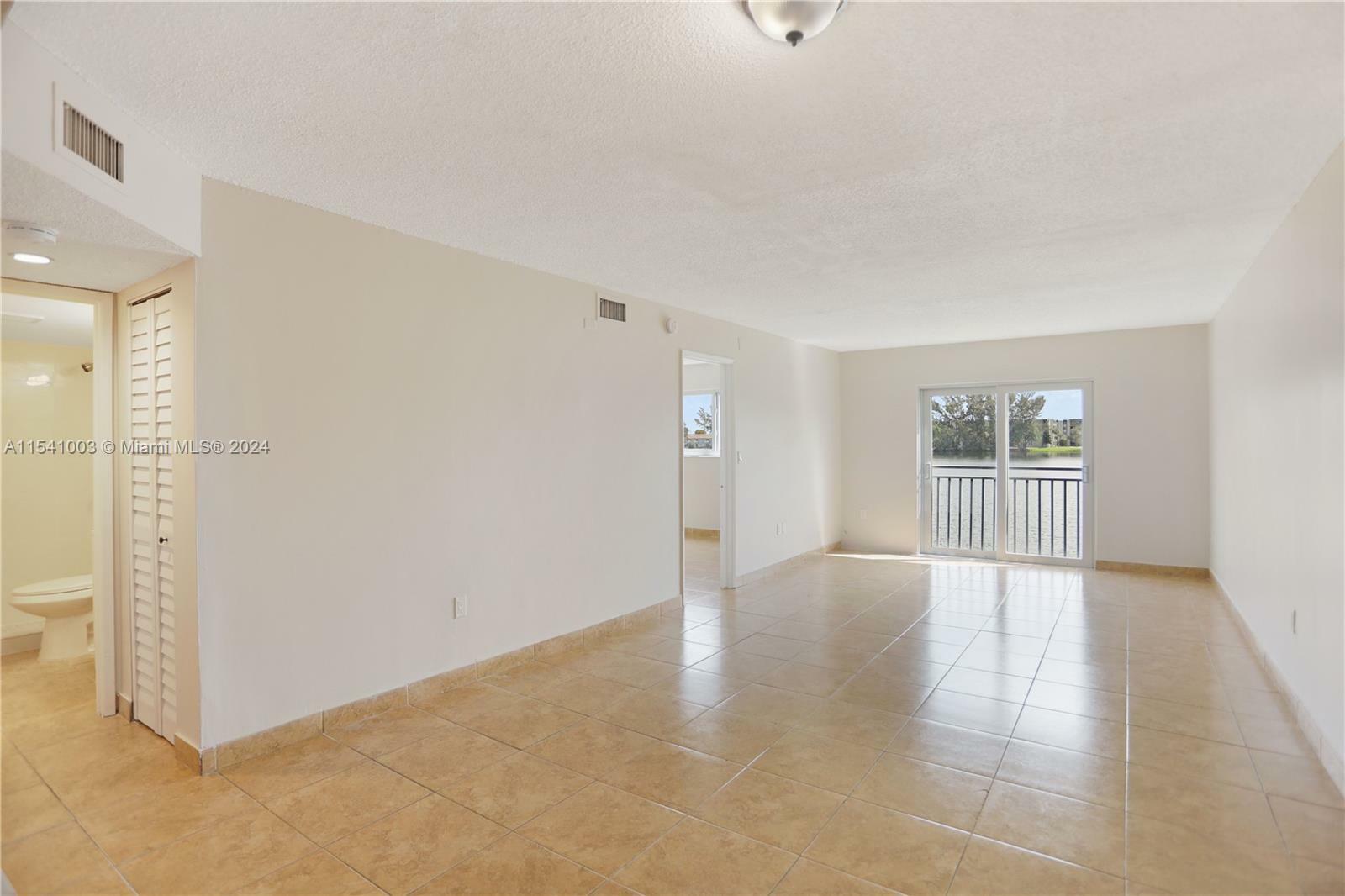 Property Photo:  9915 W Okeechobee Rd 2-207  FL 33016 