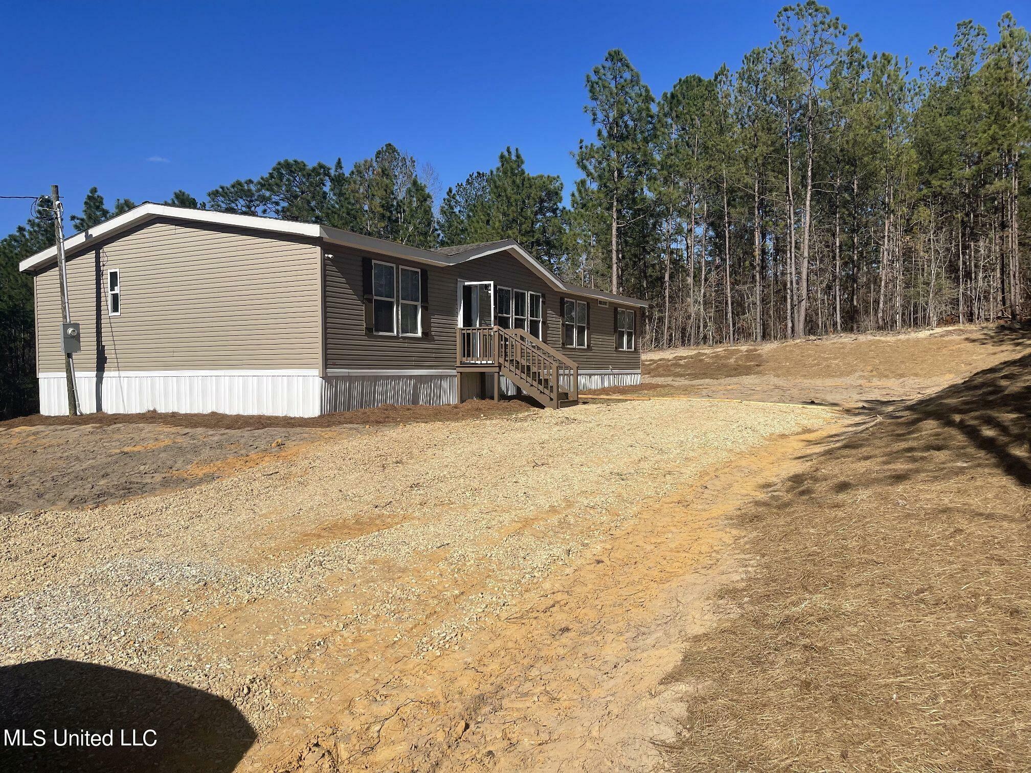 Property Photo:  2160 Purvis Baxterville Road  MS 39455 