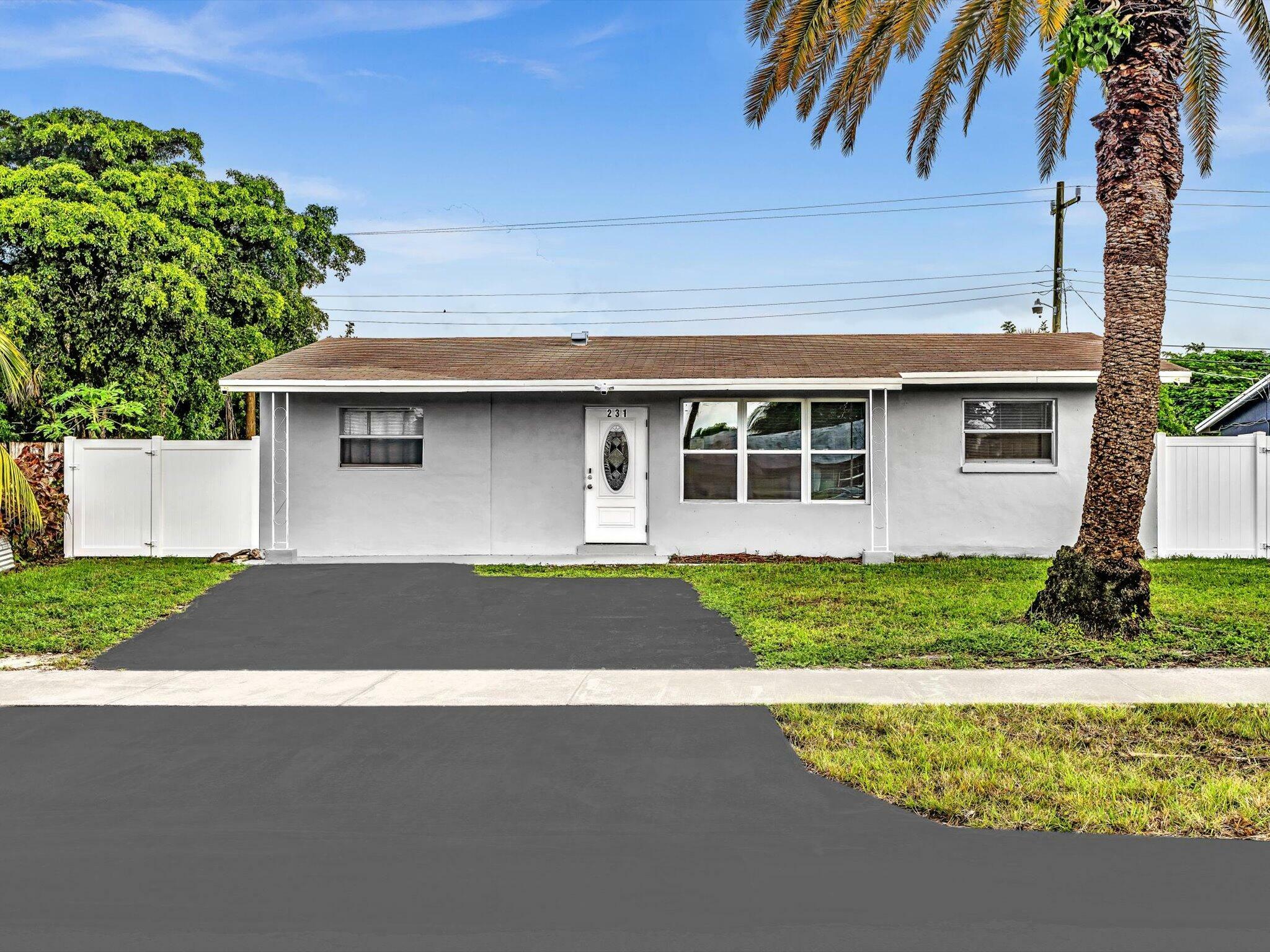 Property Photo:  231 NW 21st Street  FL 33060 