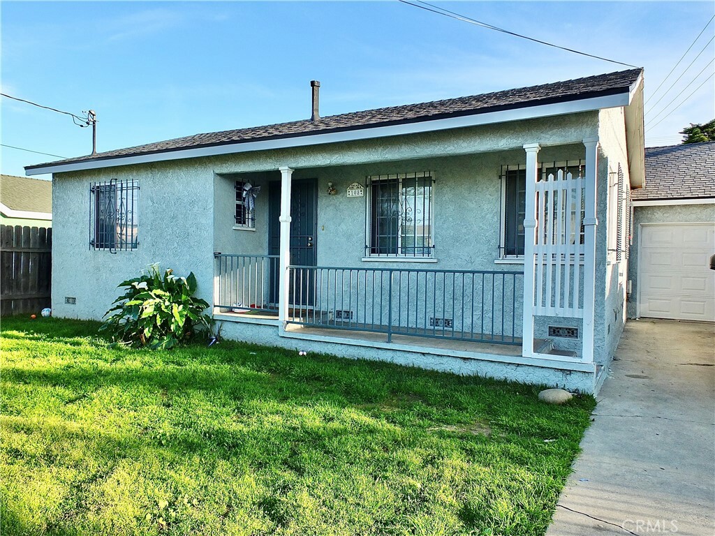 Property Photo: 108 E Cocoa Street CA 90220
