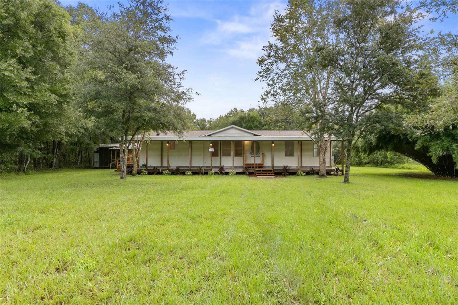 Property Photo:  1257 County Road 75  FL 32110 