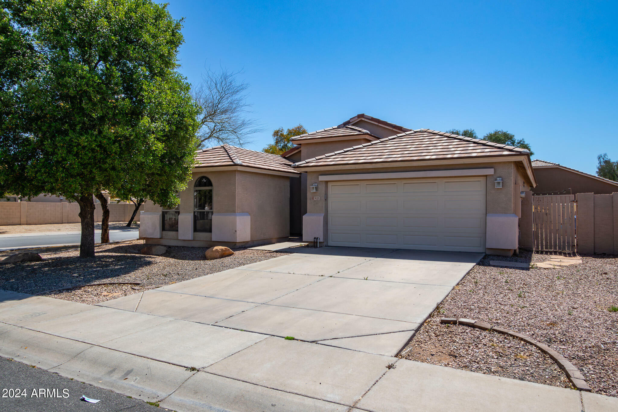 Property Photo:  9125 W Serrano Street  AZ 85037 