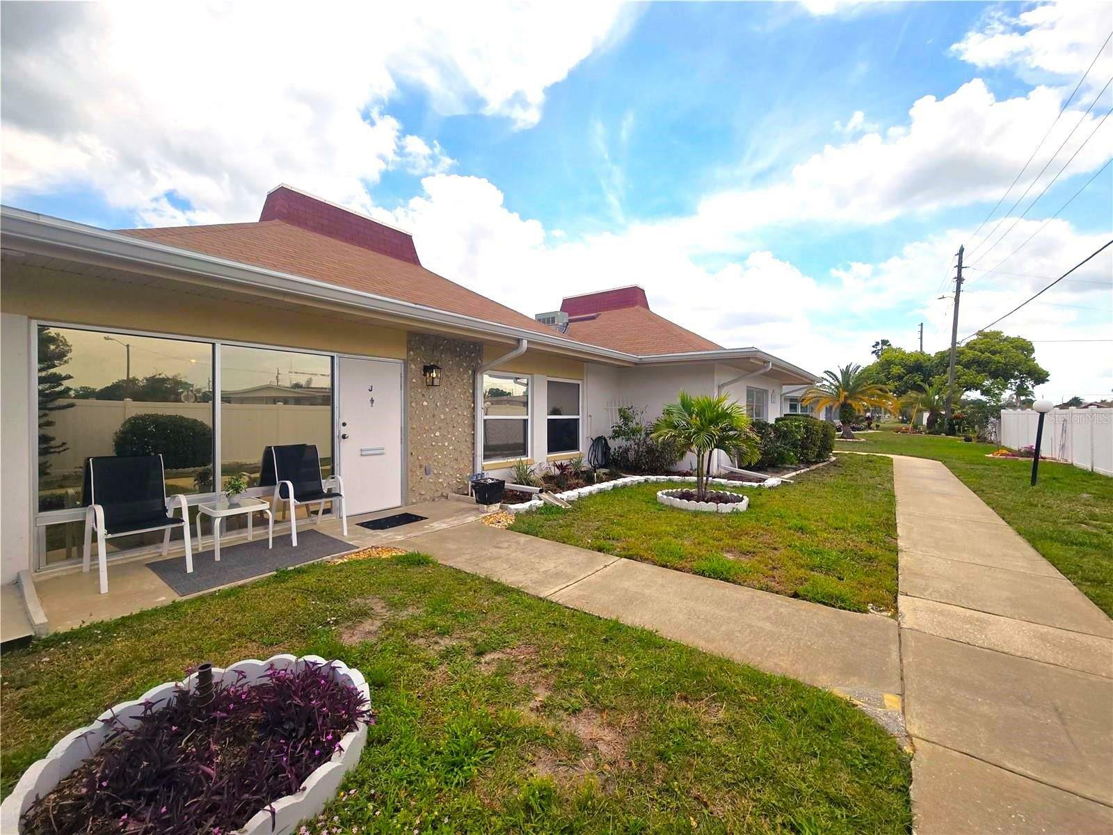 Property Photo: 4345 Tahitian Gardens Circle J FL 34691