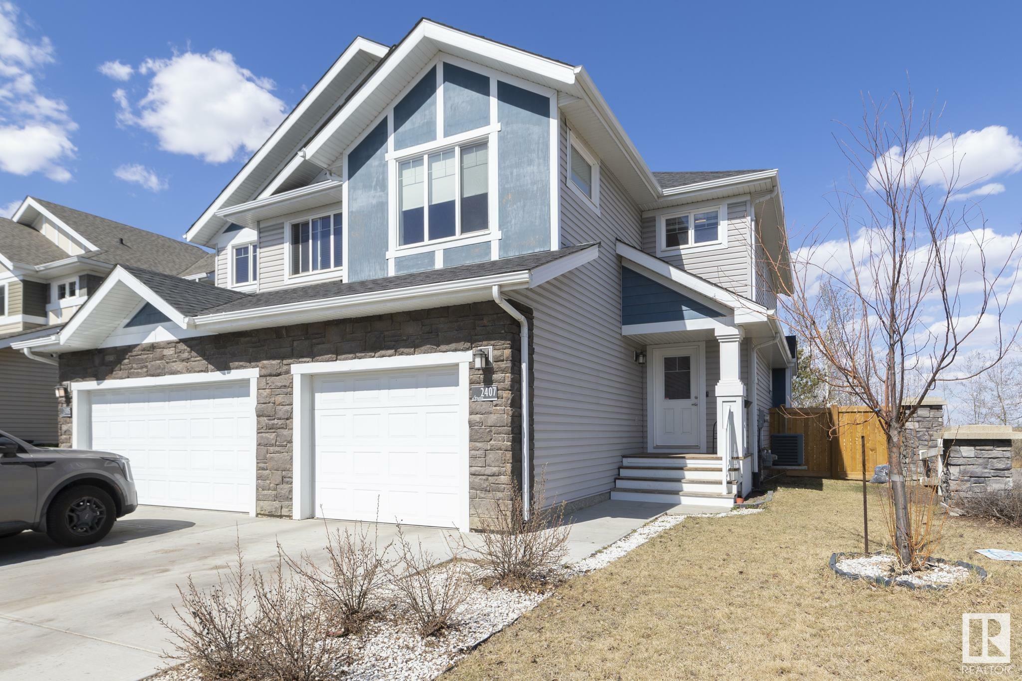 Property Photo:  2407 Sparrow Crescent NW  AB T5S 0G6 