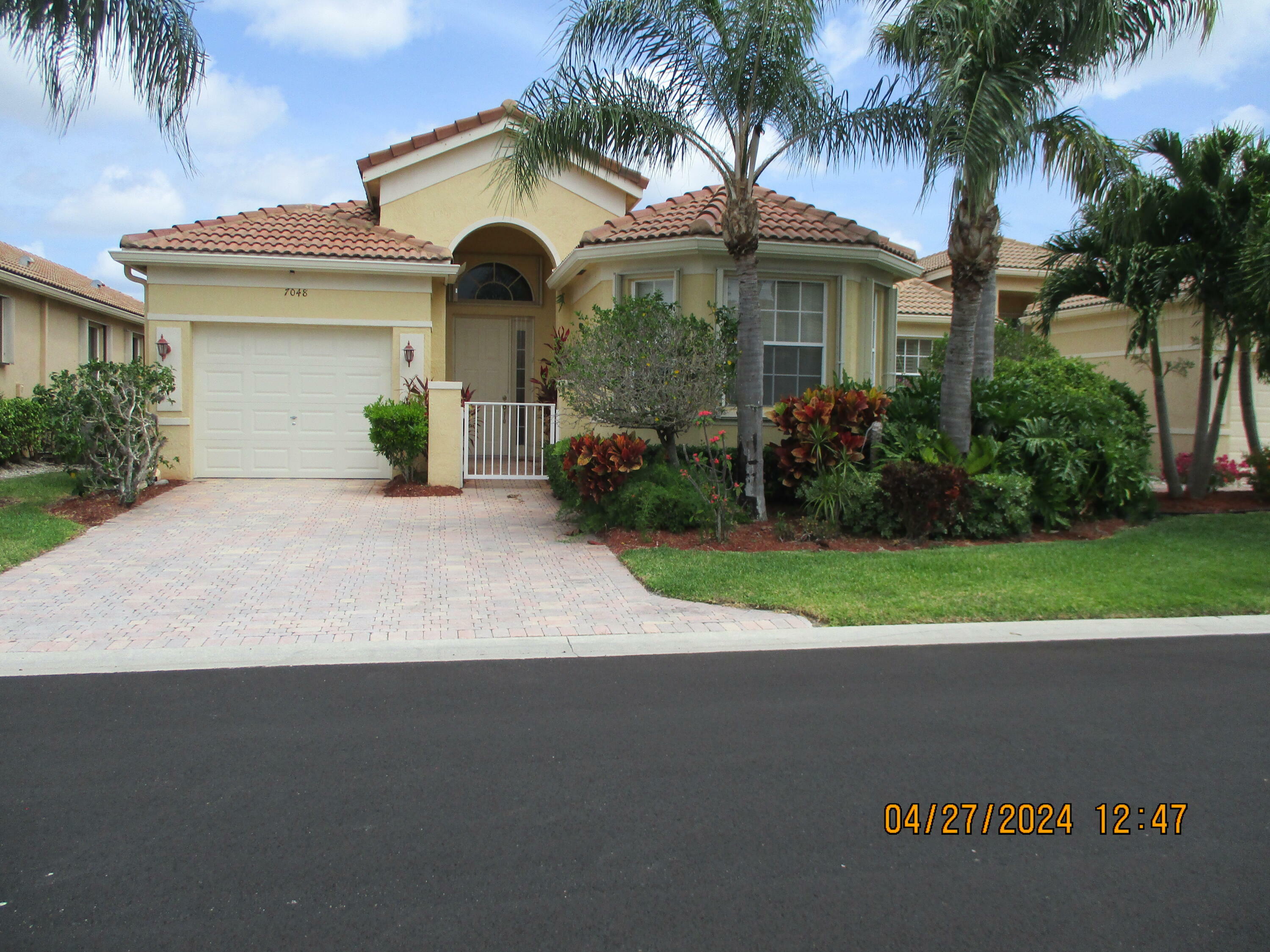 Property Photo:  7048 Cataluna Circle  FL 33446 