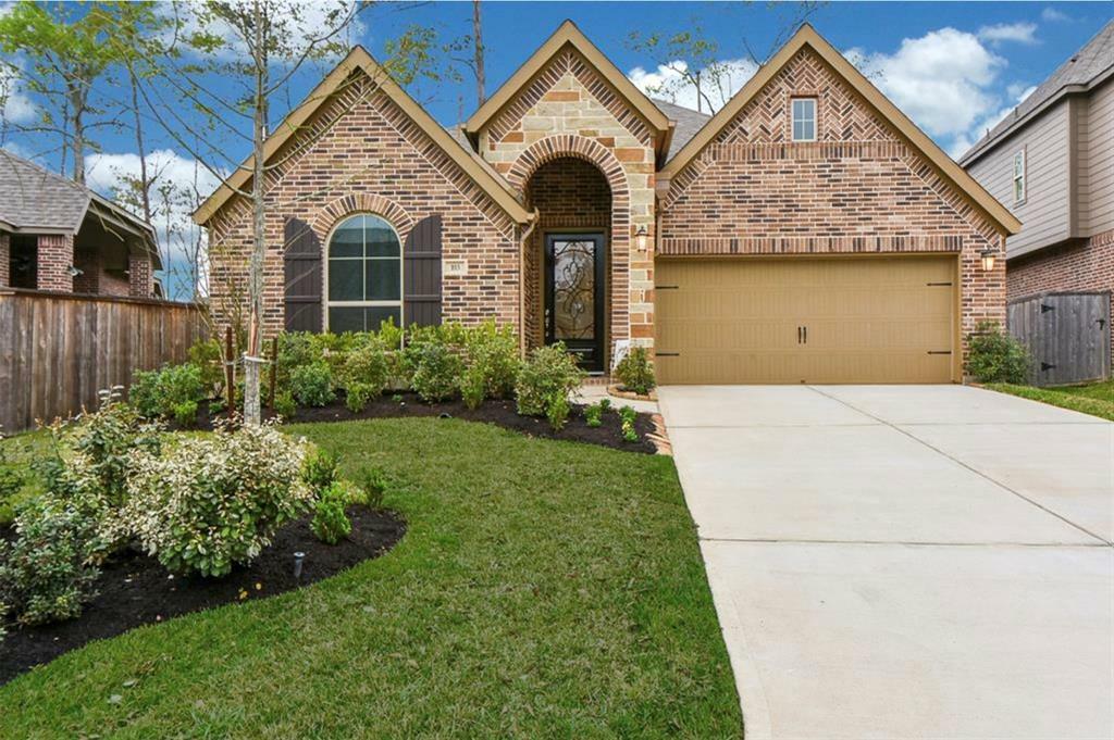 Property Photo:  103 Wild Garden Court  TX 77304 