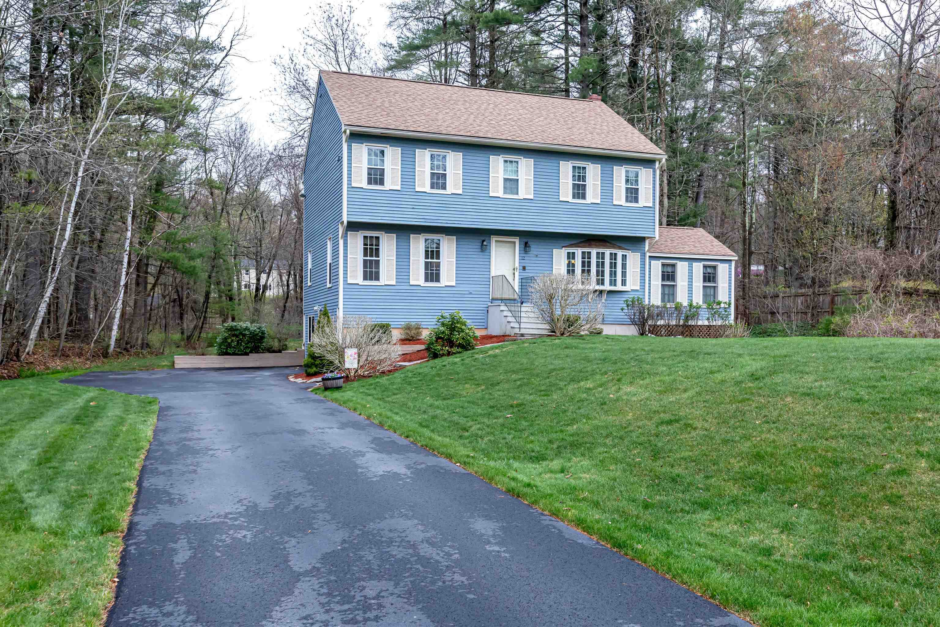 Property Photo:  12 King Arthur Drive  NH 03053 