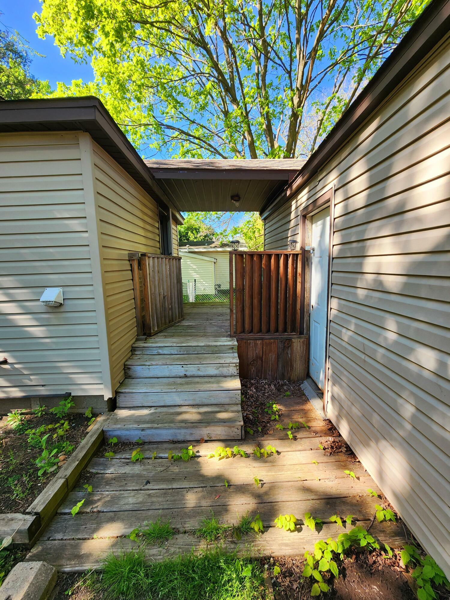 Property Photo:  120 W McNeil Street  MI 48817 