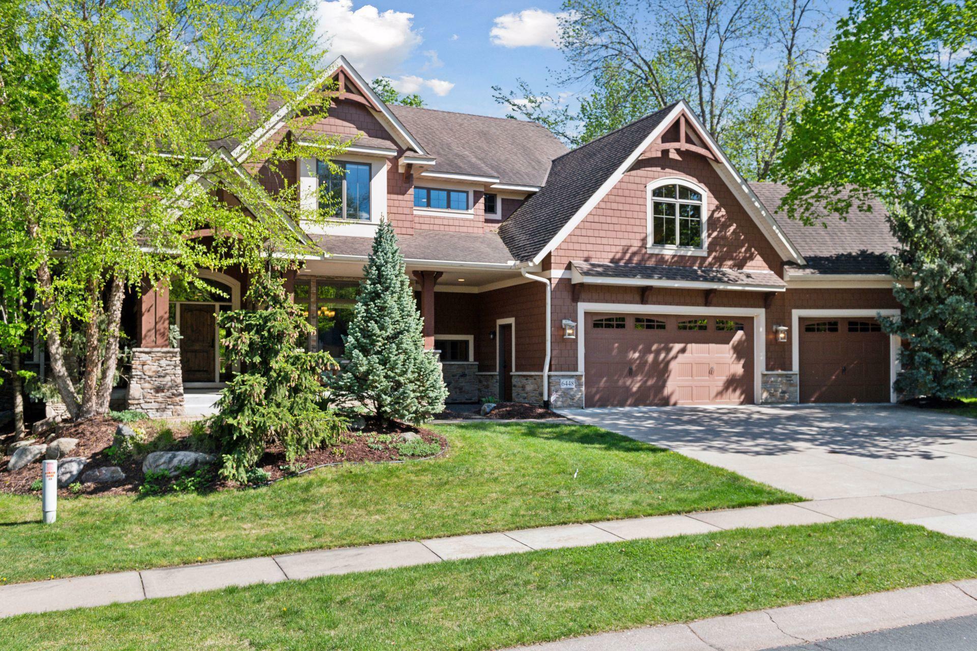 Property Photo: 6448 Queensland Lane N MN 55311