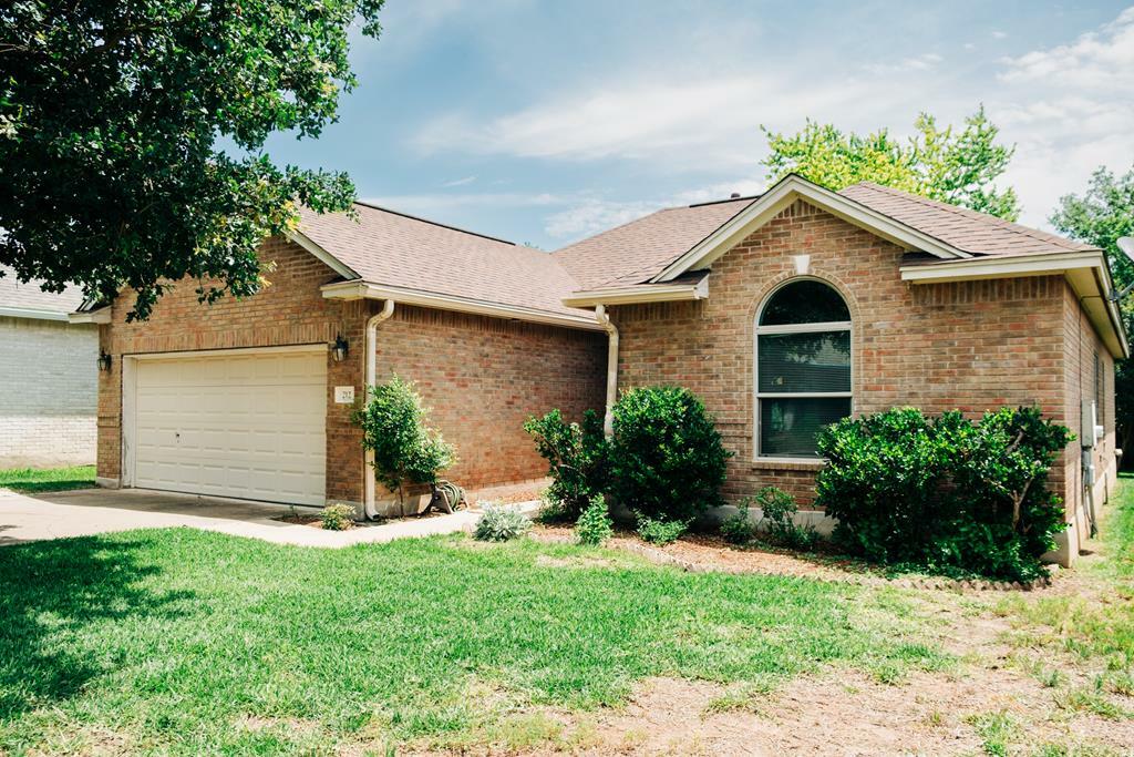 Property Photo:  212 Peach Tree  TX 78624 