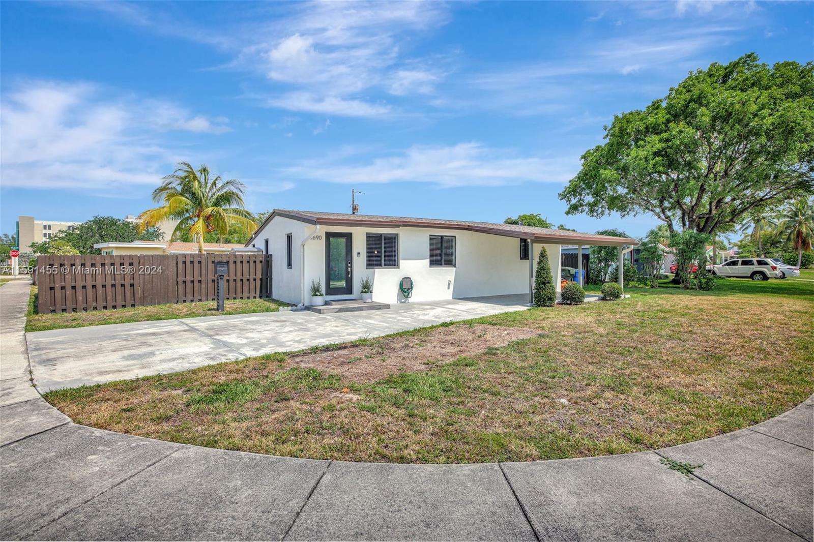 Property Photo:  5690 NE 8th Ave  FL 33334 