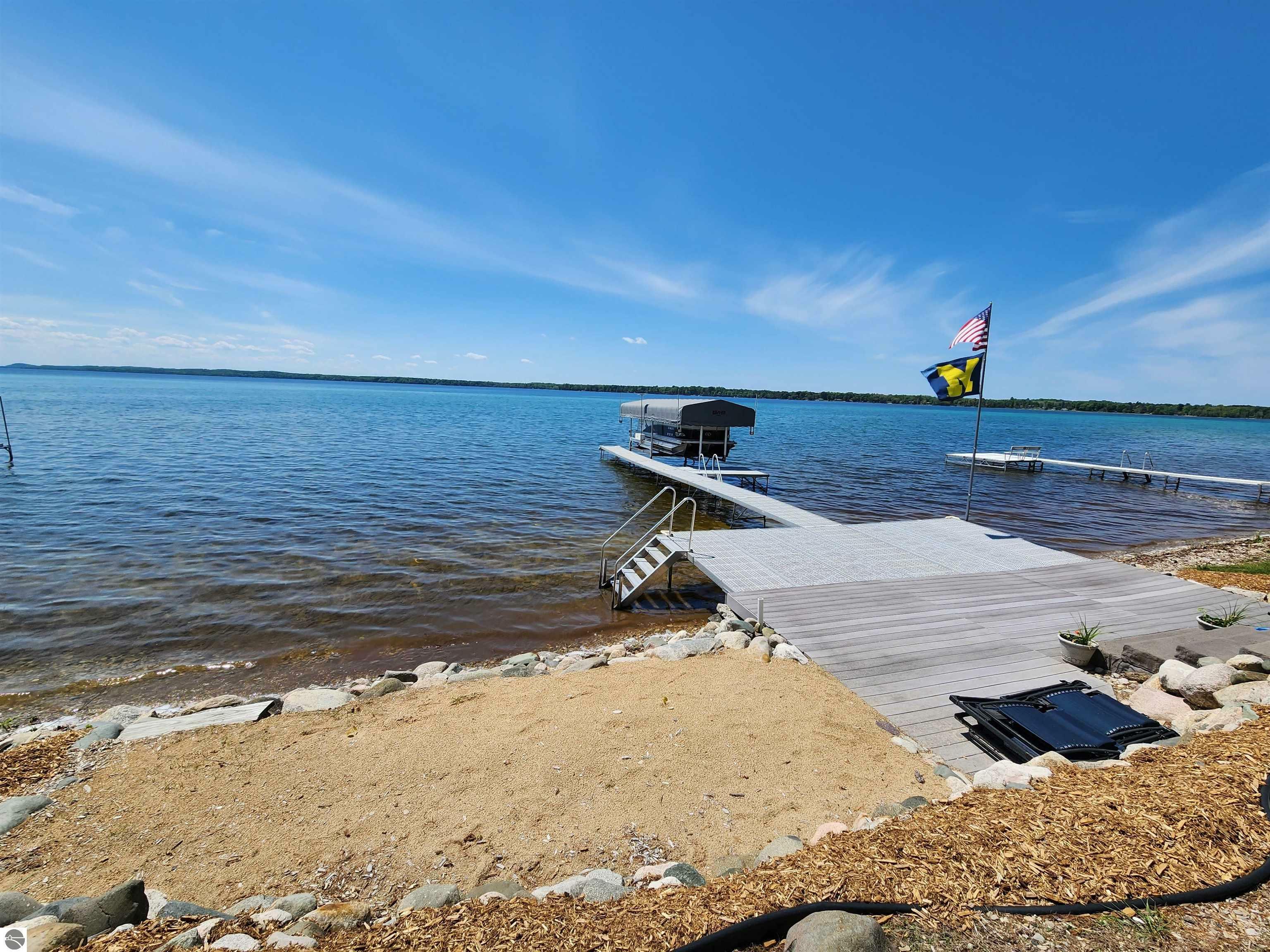 Property Photo:  4308 NE Torch Lake Drive  MI 49622 