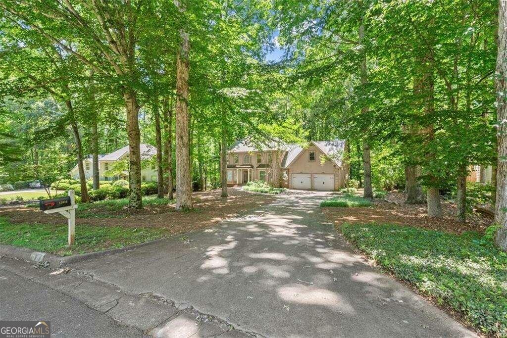 Property Photo:  12020 N Hickory Trace  GA 30004 