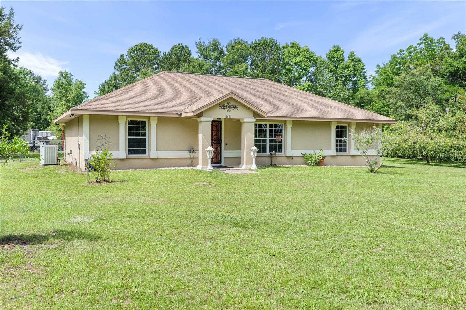 Property Photo: 17561 SW Archer Road FL 32618
