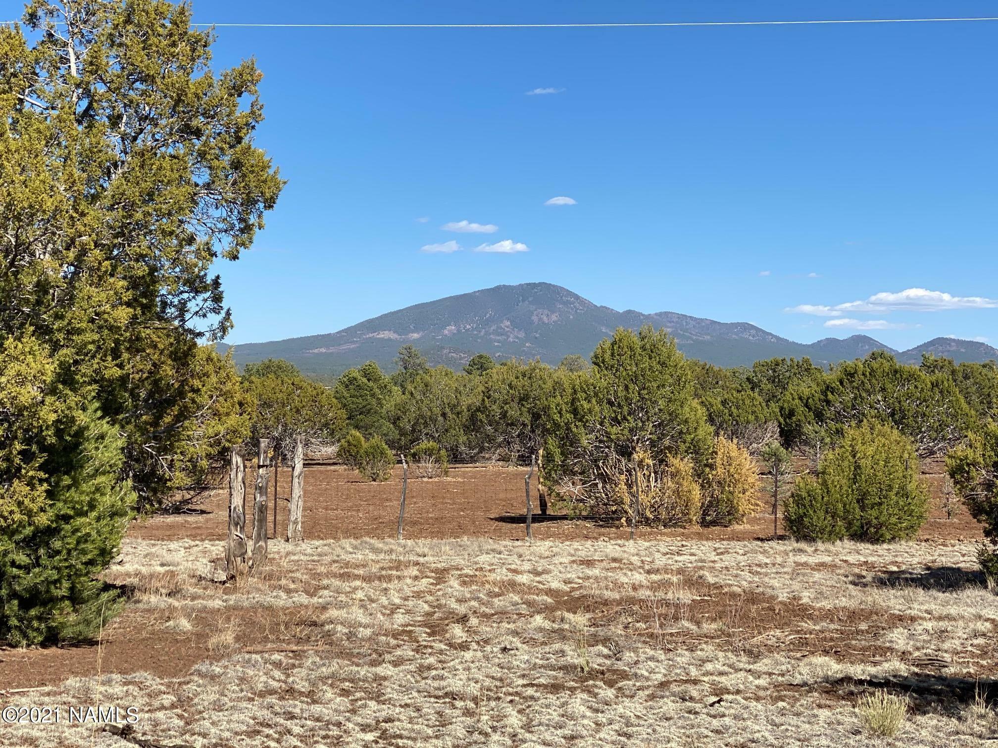 Property Photo:  7065 Tulip Trail 9  AZ 86046 