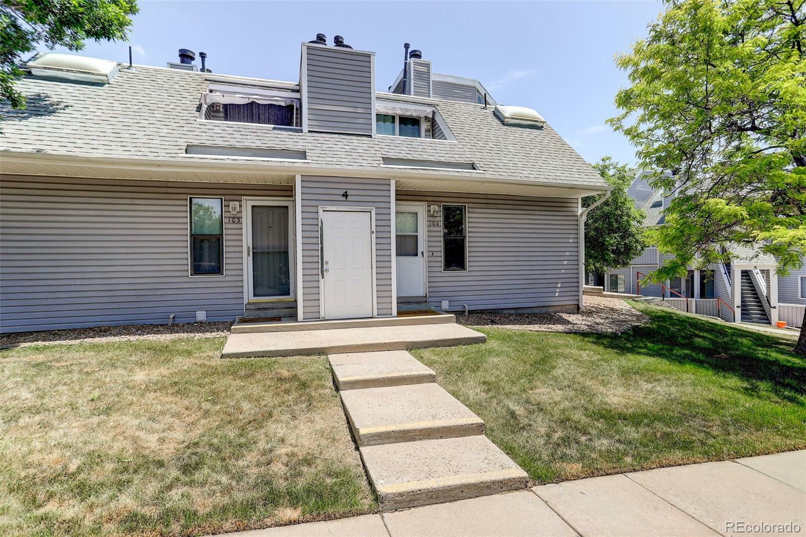 Property Photo:  8701 Huron Street 4-104  CO 80260 