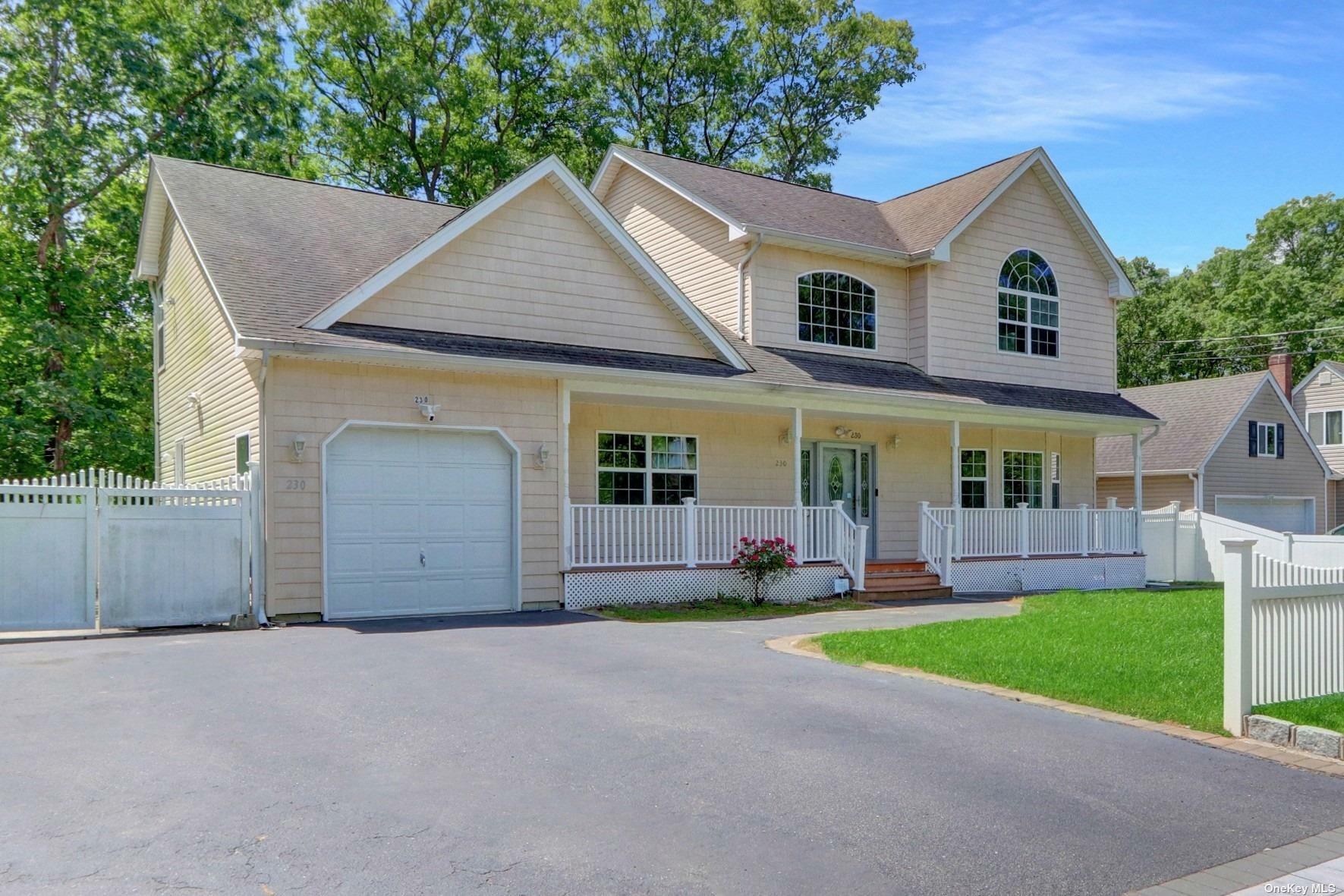 Property Photo:  230 Peconic Avenue  NY 11763 