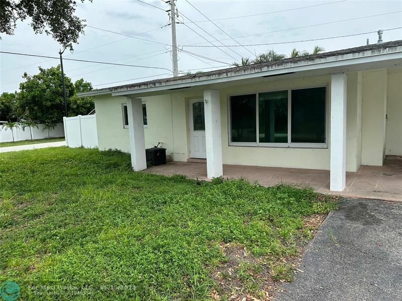 Property Photo:  3001 NE 10th Ave  FL 33064 