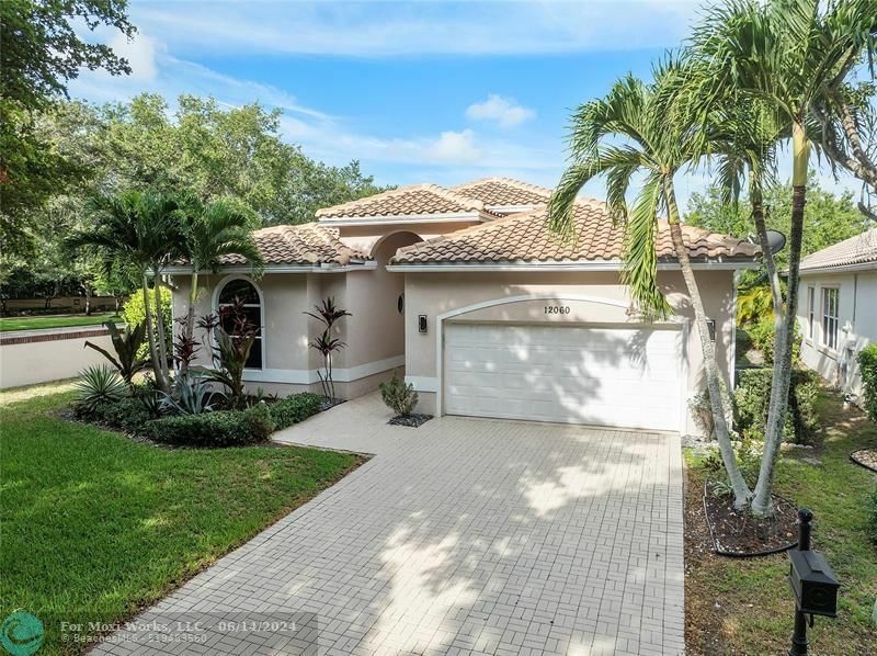 Property Photo:  12060 Glenmore Dr  FL 33071 