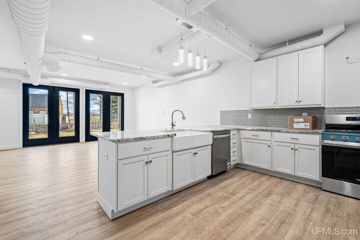 Property Photo:  2401 N Lakeshore Boulevard Unit #6 (Floor Plan B)  MI 49855 