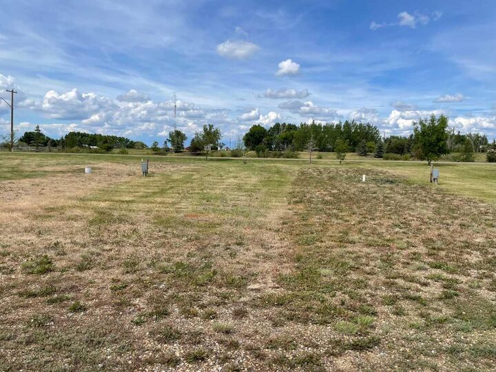 Property Photo: 100 Roseglen Close 14 AB T1R 2W0