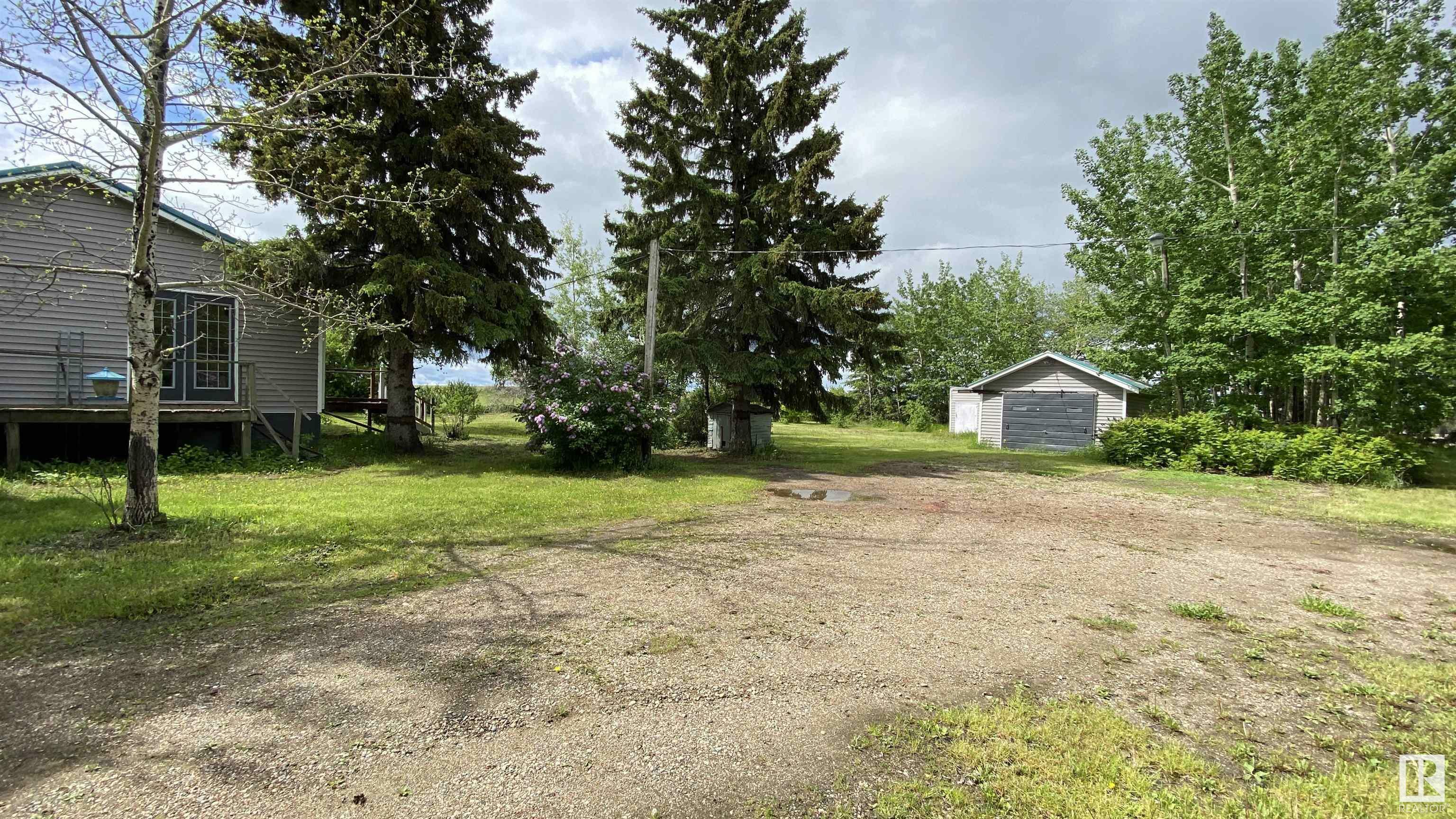 Property Photo:  59310 Rng Rd 112  AB T0A 0C0 