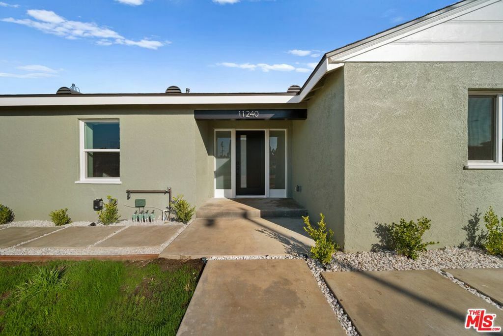 Property Photo:  11240 Southwest Boulevard  CA 90044 