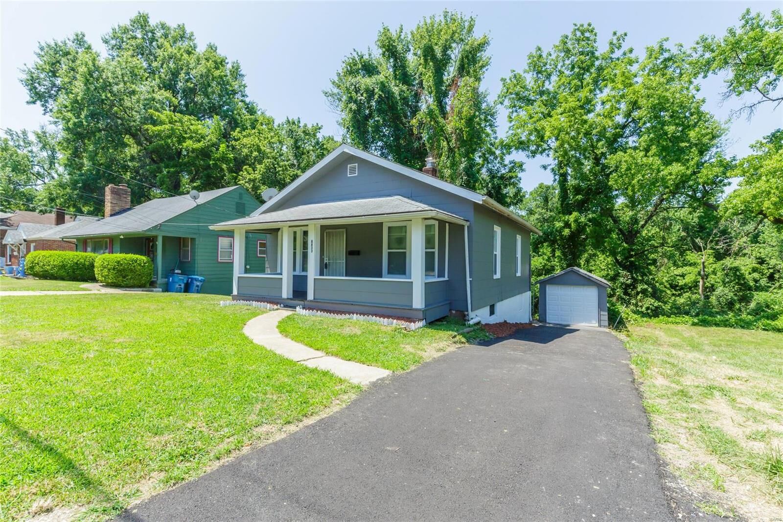 Property Photo:  8833 Blewett Avenue  MO 63136 